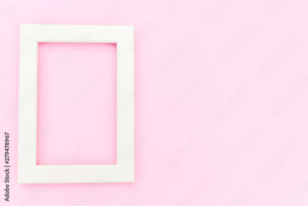 Simply design with empty pink frame isolated on pink pastel colorful background. Top view, flat lay, copy space, mock up. Minimal concept Simply design with empty pink frame isolated on pink pastel colorful background. Top view, flat lay, copy space, mock up. Minimal concept