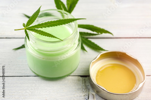 CBD Cannabis Hemp topical cream balm with cannabis leafs photo