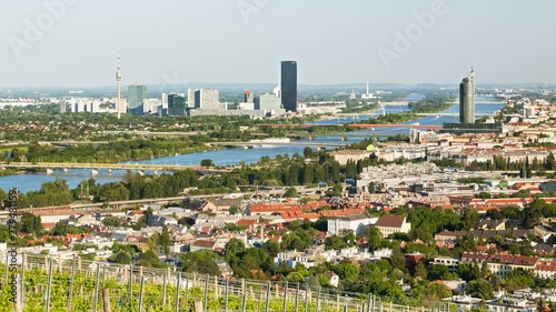 Timelapse view from a vineyard hill over Vienna, Austria to the Danube river, International Centre and Donaucity.