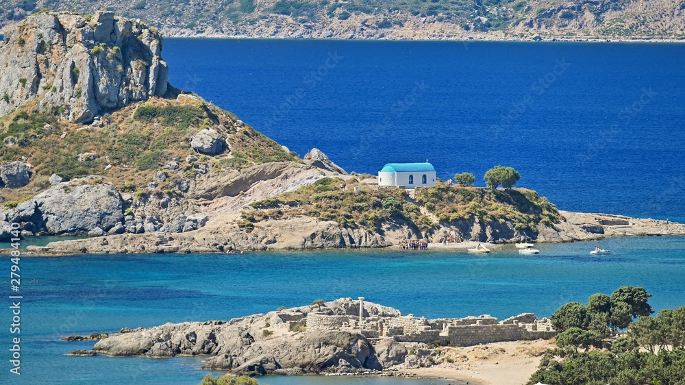 Vrachonisida Kastri - Greece island Kos. Beautiful concept for summer vacation and holiday. Beautiful landscape with sea, island and traditional small greek chapel.Natural colorful background.