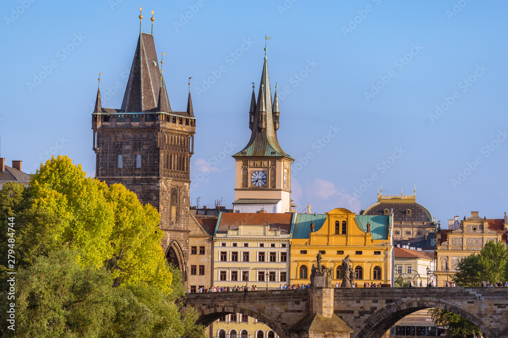 Prague cityscape with historic landmark of Charles Bridge with crowd of people
