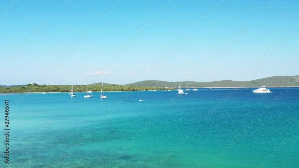 Croatia, Adriatic coast, peninsula on Veli Rat on the island of Dugi Otok, beautiful archipelago with sailboats and yachts, drone flying over blue lagoon Croatia, Adriatic coast, peninsula on Veli Rat on the island of Dugi Otok, beautiful archipelago with sailboats and yachts, drone flying over blue lagoon