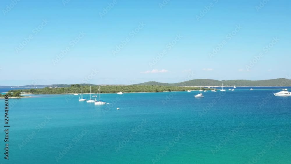 Beautiful seascape on Adriatic sea in Croatia, Dugi otok island, drone flying above sailing boat on seashore in blue bay lagoon Beautiful seascape on Adriatic sea in Croatia, Dugi otok island, drone flying above sailing boat on seashore in blue bay lagoon