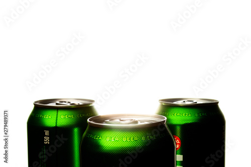 Three green cans of beer.