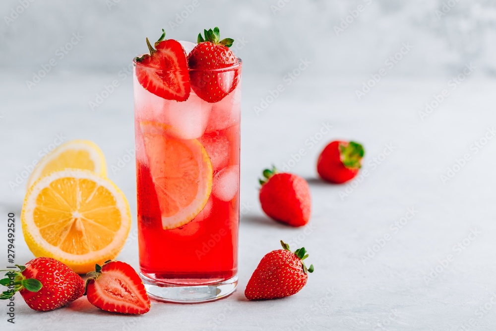 Refreshing Strawberry and lemon Iced Tea or lemonade in a glass Refreshing Strawberry and lemon Iced Tea or lemonade in a glass