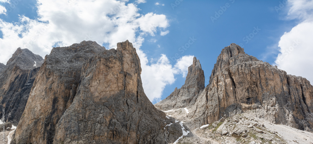 Panoramic view of Catinaccio mountain and Vajolet Towers on the way to Passo Santner. Dolomites, Italy