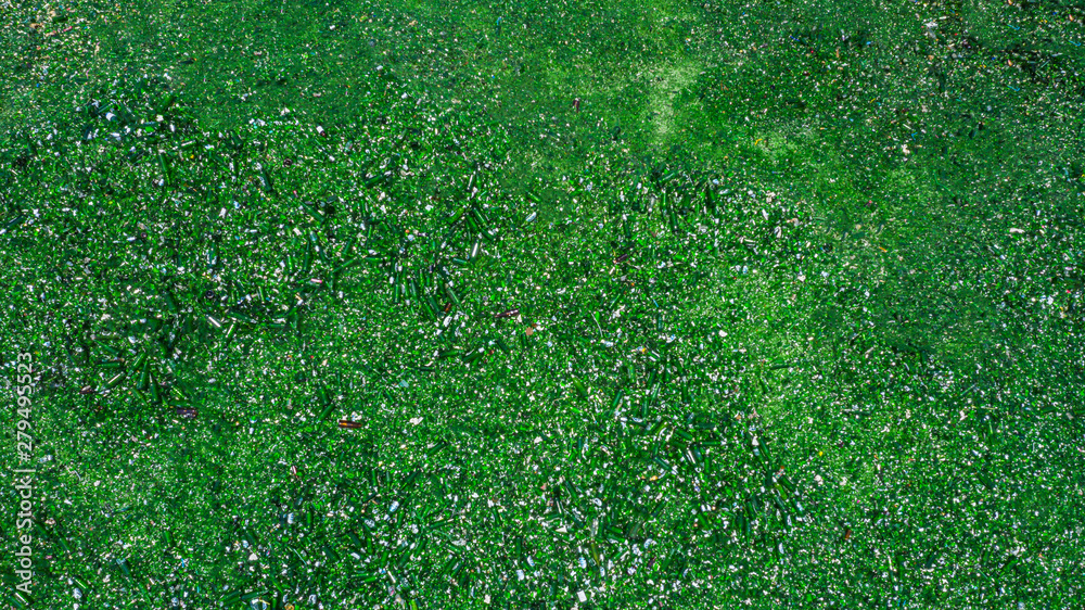 Fototapeta premium Aerial view glass bottles at the garbage dump, Recycling glass bottles.