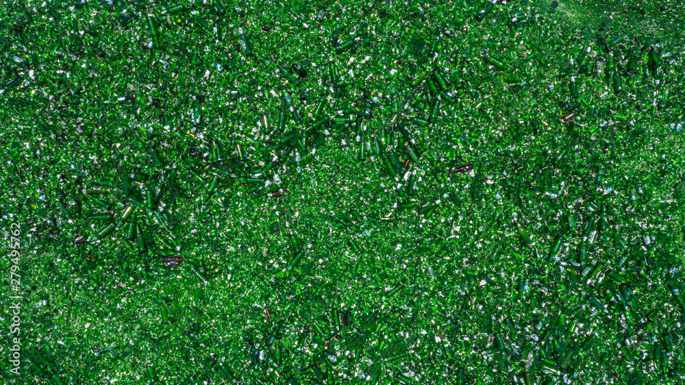 Fototapeta premium Aerial view glass bottles at the garbage dump, Recycling glass bottles.