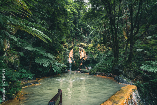 Fototapeta Naklejka Na Ścianę i Meble -  Waterfall in Caldeira Velha, ribeira grande, Natural Spa, Sao Miguel, Azores, Portugal