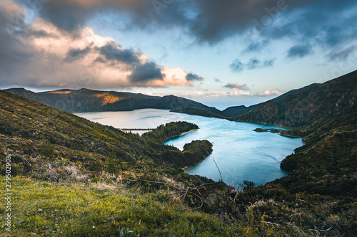 Beautiful panoramic view of Lagoa do Fogo, Lake of Fire, in Sao Miguel Island, Azores, Portugal. Sunny day with blue sky and clouds.