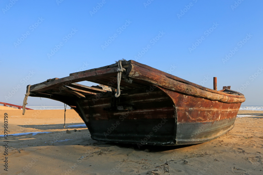 Wooden boats on the beach Wooden boats on the beach