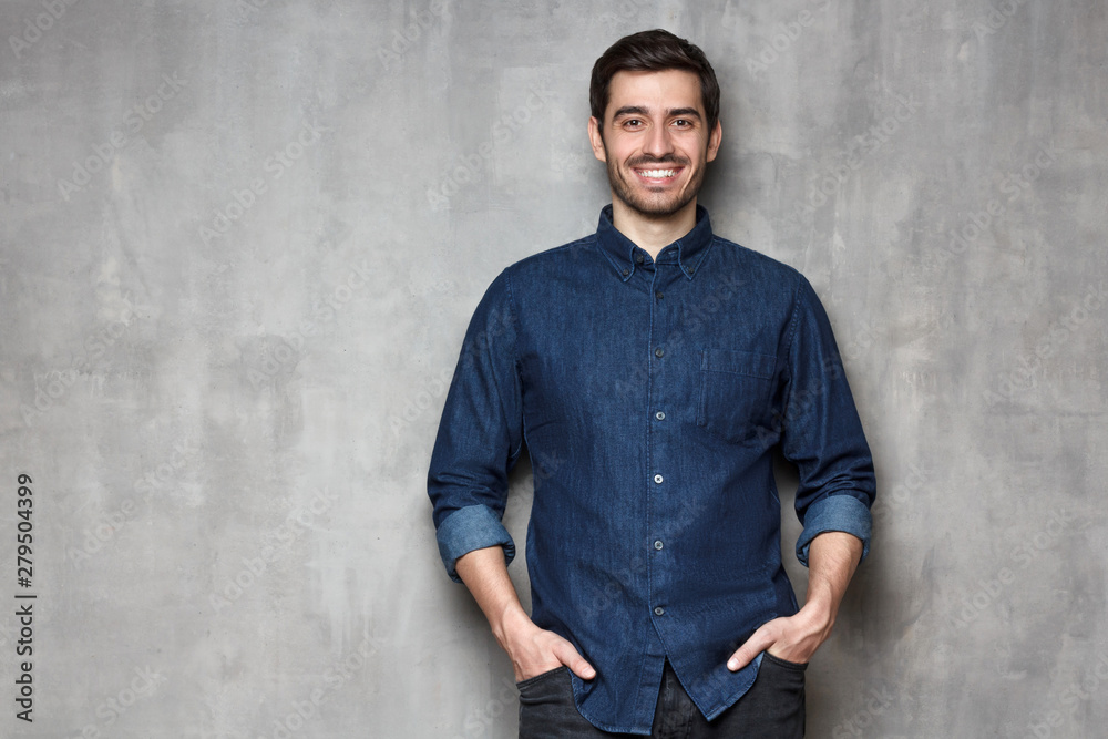 Portrait of relaxed man isolated on gray backgrund Portrait of relaxed man isolated on gray backgrund