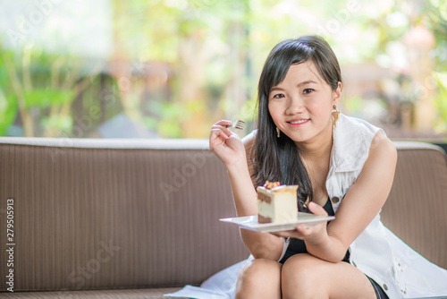 Student asian women sitting in cafe drink coffee