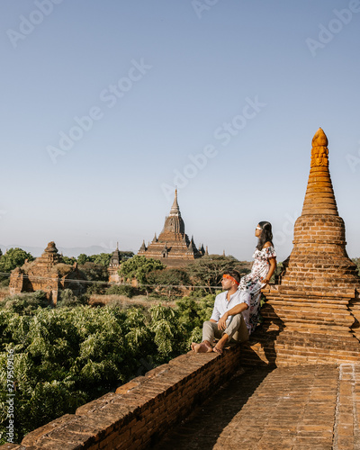 Bagan Myanmar during sunrise, men and woman mid age visit Bagan hisorical site during sunrise at vacation Pagan Myanar photo