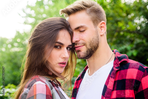 Love time. valentines day. summer camping in forest. couple in love. Hiking. man and woman in checkered shirt relax in park. family weekend. romantic date. hipster couple outdoor © be free
