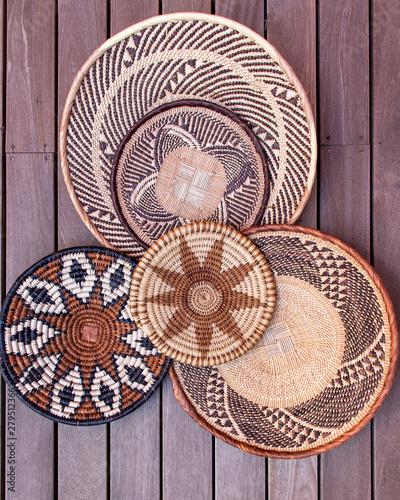 African grass baskets on a wooden background 