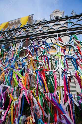 BELEM, PA - BRAZIL - OCTOBER 6: Colorful fabric bracelets adorn the Nazareth Cathedral gate, in Belem, in 2016. It's a tradition to tie the bracelets in these gates to have wishes fulfilled.
