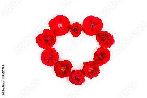 heart made of red roses isolated on white