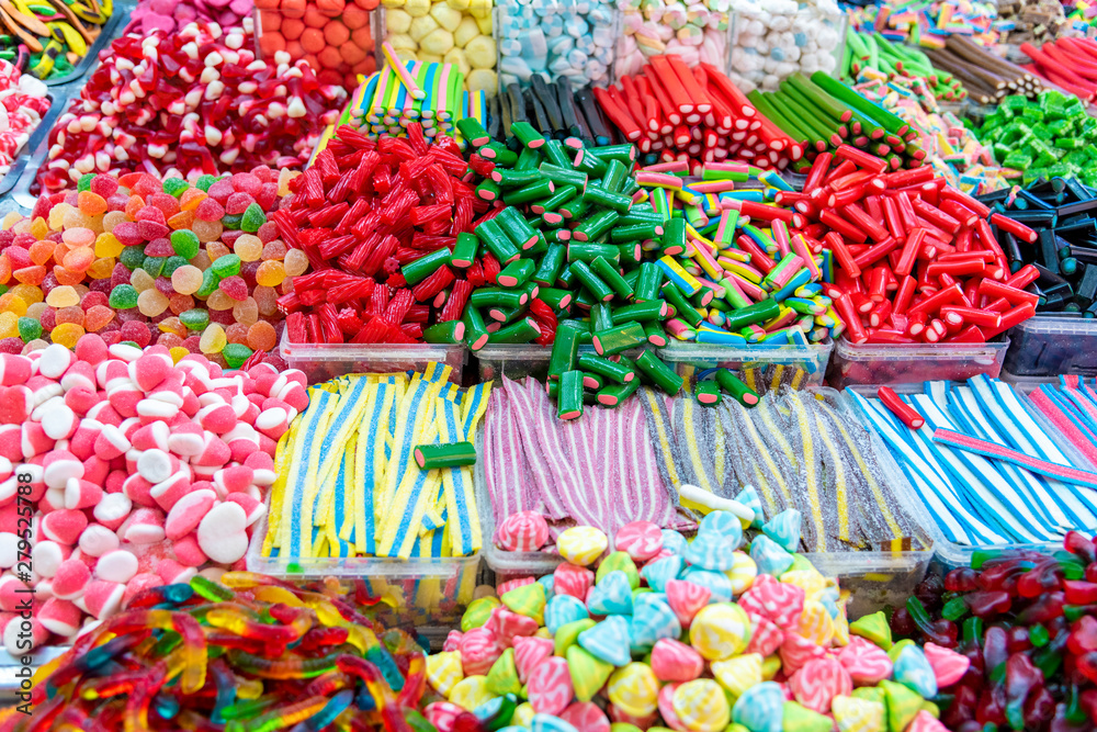 Confectionery shop at Carmel market in Tel Aviv, Israel. Colorful gumdrops and wine gum sweets. Market stall full of candys.
