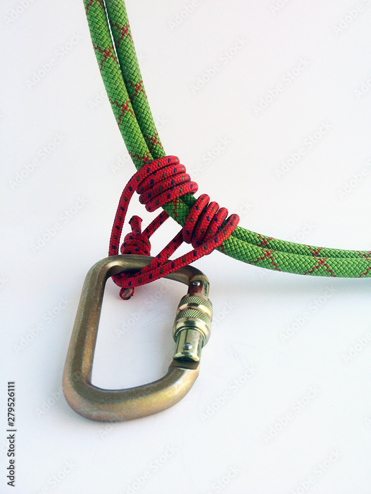 maontaineering techniques abseil or rappel prusik knot on carabiner Stock  Photo
