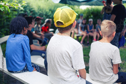 Meeting of children in the summer camp in a sunny day