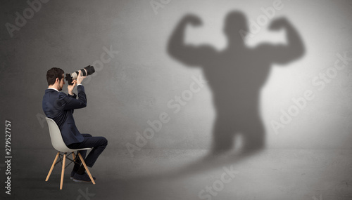 Canvas Print Businessman staying and offering stuffs to a shadow businessman