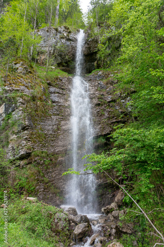 Waterfall in the deep forest on mountain.