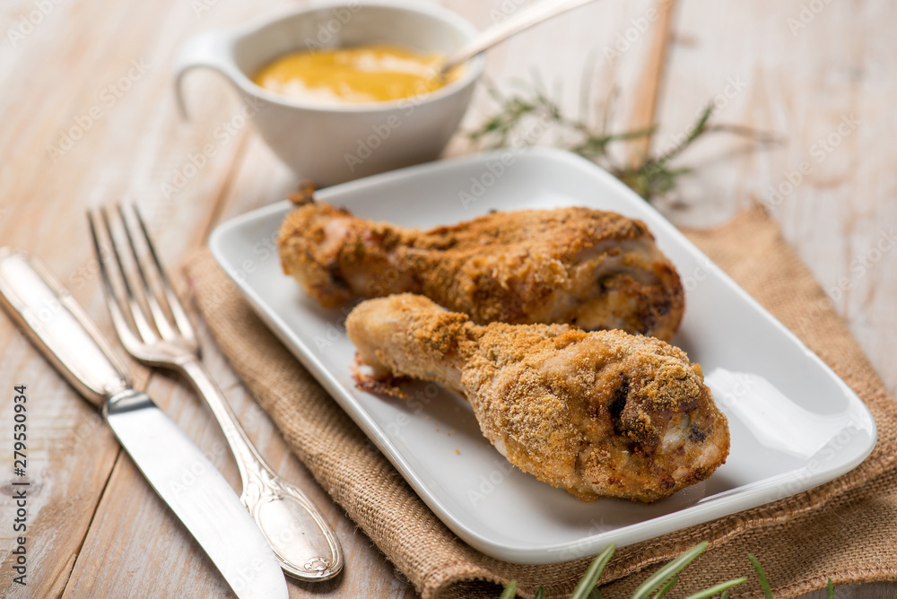 baked chicken legs with mustard and rosemary