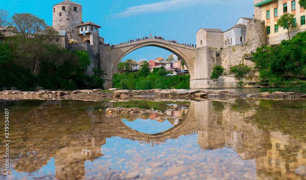 Stari Most is a reconstruction of a 16th-century Ottoman bridge in the city of Mostar in Bosnia and Herzegovina that crosses the river Neretva and connects two parts of the city.