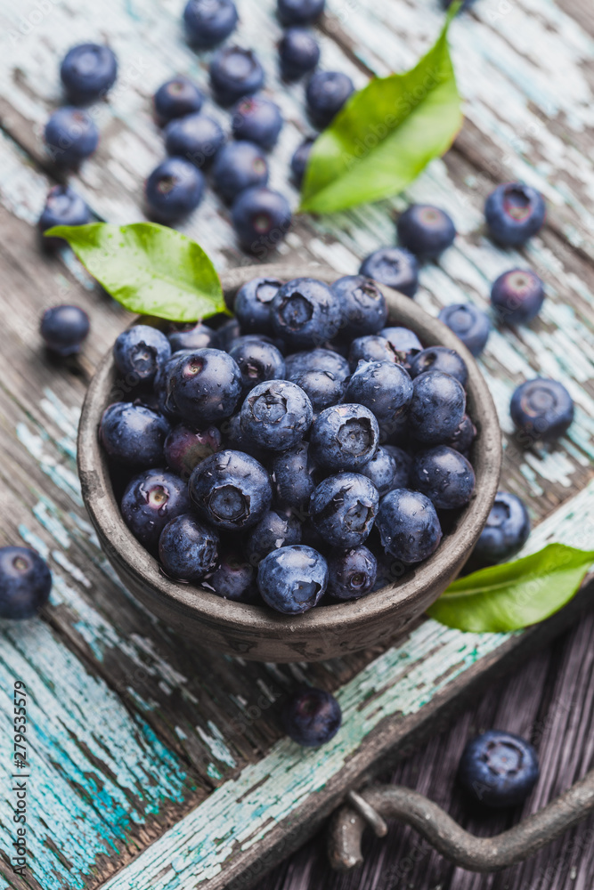 ripe blueberry berries on old wooden table. healthy food ripe blueberry berries on old wooden table. healthy food