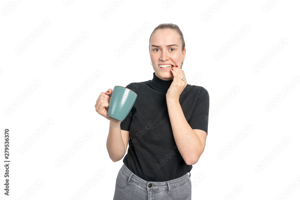 Young woman is heat sensitive when drinking hot drinks Young woman is heat sensitive when drinking hot drinks