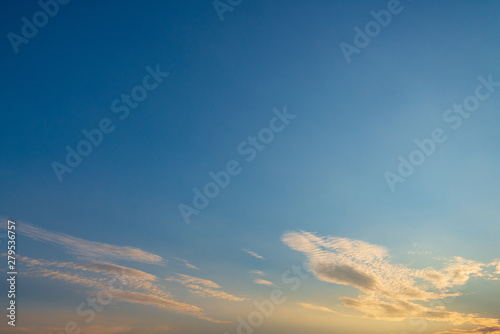 Beautiful golden sunny view of deep blue sky and Altocumulus cloud during evening sunset time. 