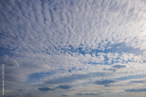 Beautiful sunny view of deep blue sky and Altocumulus cloud.  photo