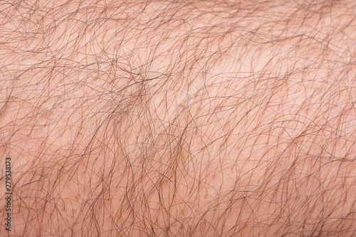 Closeup to hair arm of man
