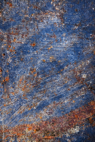 old blue paint on rusty metal