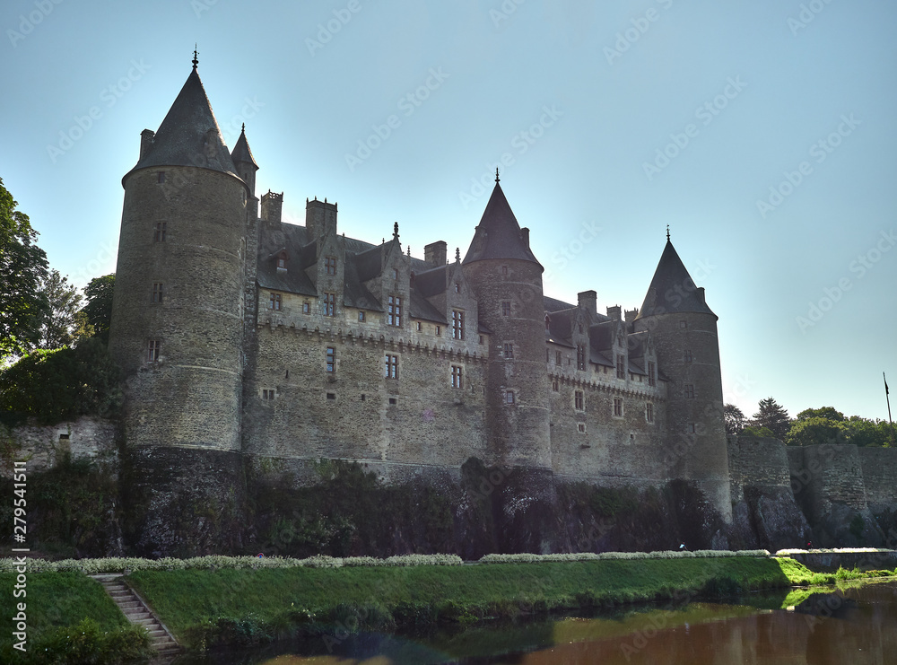 Dramatic vintage landscape view of the chateau castle of the medieval town of Josselin, Morbihan Department, Brittany Region, France