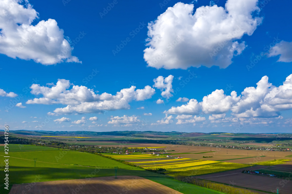 Fototapeta premium Aerial view of pasture and farmed fields