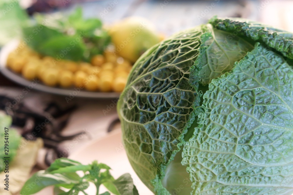 Obraz premium Fresh vegetables, fruits and spices on a wooden table, cooking healthy food, autumn, summer season