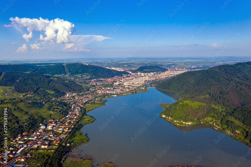 Above view of lake and city, summer scene