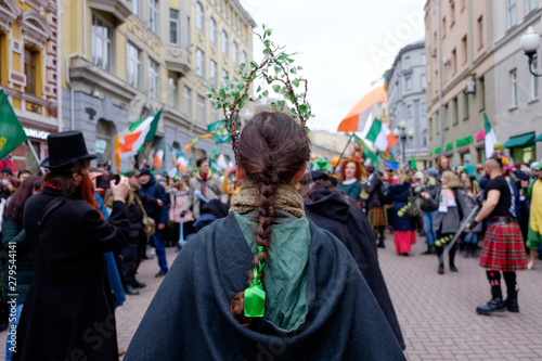 Girl with hair decorations for St. Patrick's Day