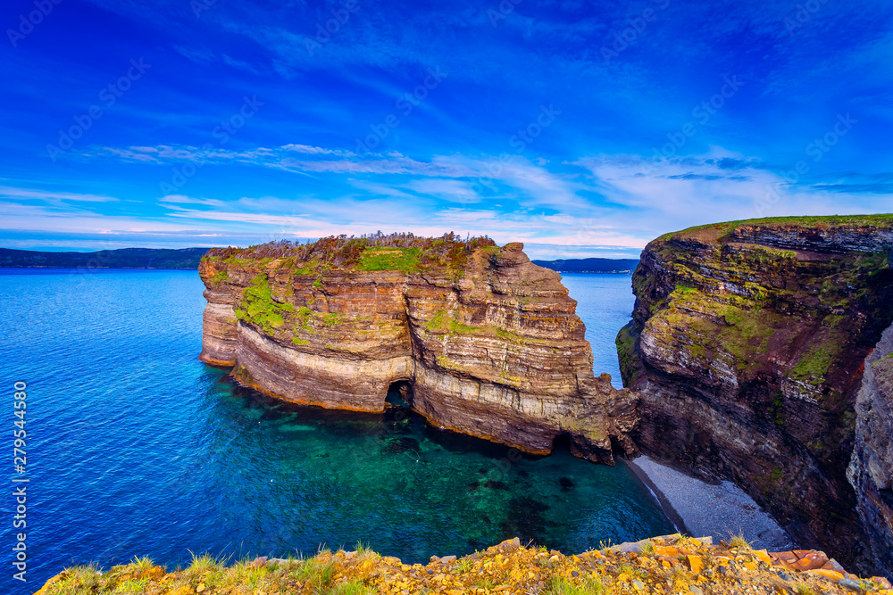 Fototapeta premium View of the cliff and the rock at Bell Island Light House, Newfoundland, Canada