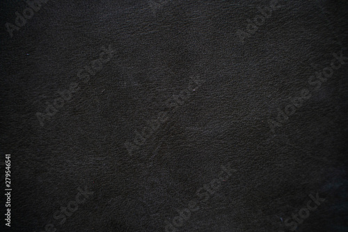 Luxury black genuine leather texture close up