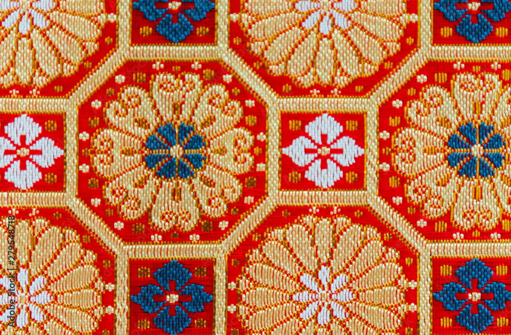 Japanese pattern of gold-red traditional silk fabric