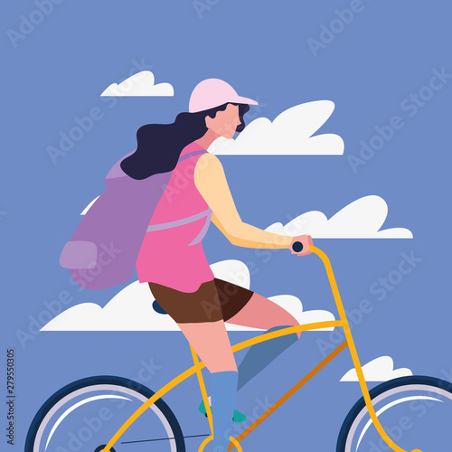 traveler woman with bag riding bicycle