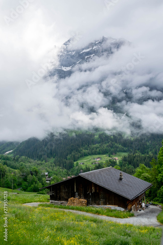 Beautiful view on House in Switzerland Alps mountains, Grindelwald, Switzerland