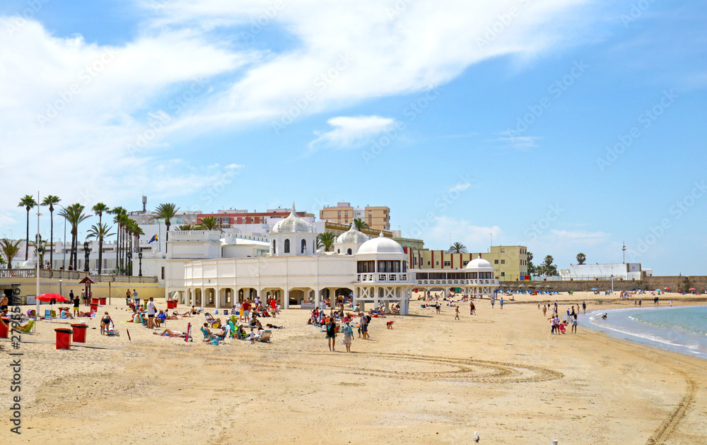 Playa La Caleta Beach at Cadiz, Andalusia. Spain.  Unrecognizable Beach Goers and Swimmers.
