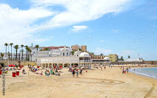 Playa La Caleta Beach at Cadiz  Andalusia. Spain.  Unrecognizable Beach Goers and Swimmers.
