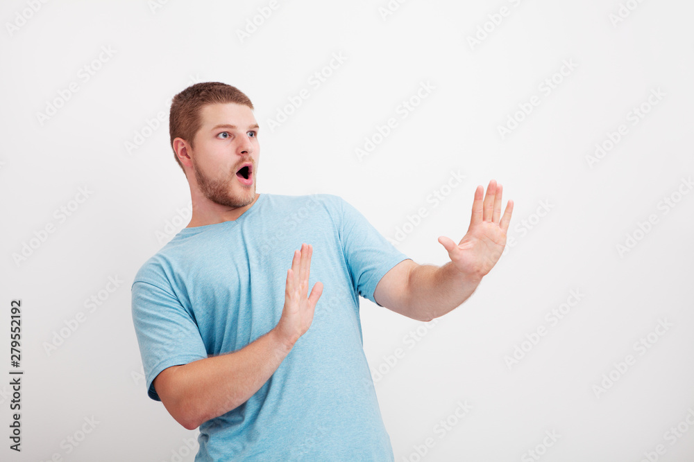 Stunned man portrait isolated on neutral background Stunned man portrait isolated on neutral background