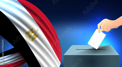 Male hand puts down a white sheet of paper with a mark as a symbol of a ballot paper against the background of the egypt flag, egypt the symbol of elections