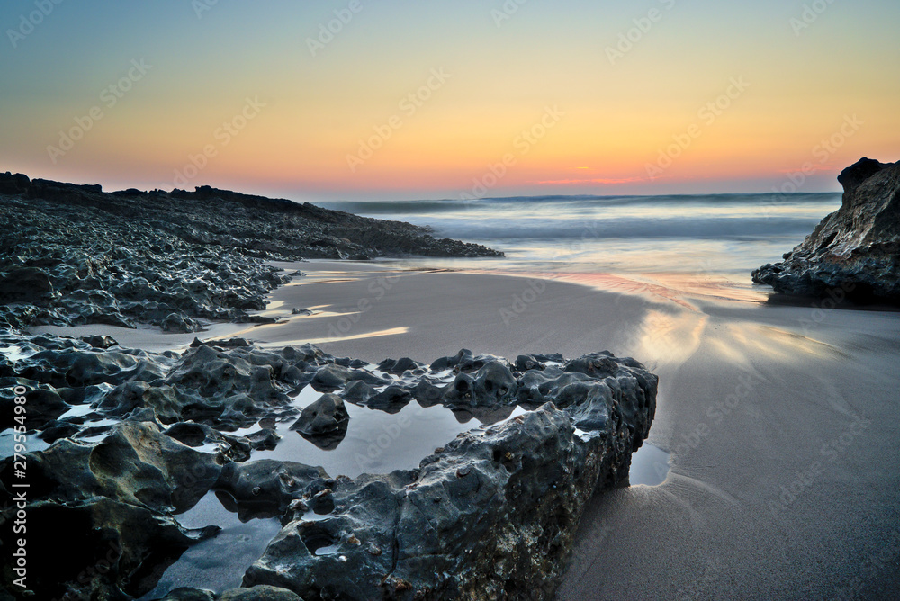 Obraz premium Sunset at the beach